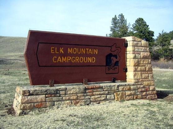 Entrance sign for Elk Mountain Campground in Wind Cave National Park. Entrance sign for Elk Mountain Campground in Wind Cave National Park.