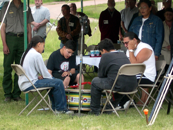 The Thunder Ridge Singers from Pine Ridge perform the Oglala Lakota Nation Flag Song during the centennial banquet.