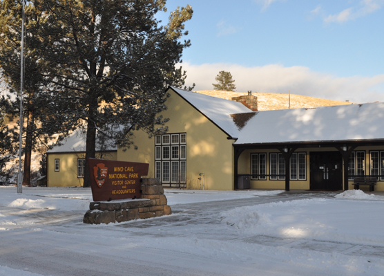 Wind Cave National Park Visitor Center on a winter day with snow on the ground.