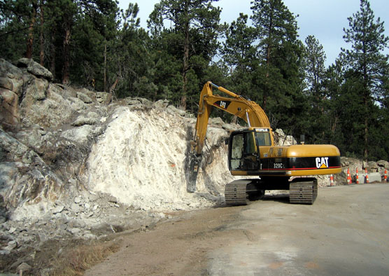 Work on the Pigtail Bridge began this fall when part of a nearby rock wall was removed to increase the turning radius on the south-bound approach.