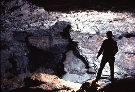 Cave explorers standing in Snowdrift Avenue in Wind Cave National Park.