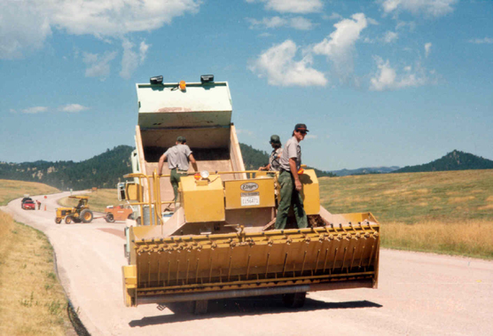 Wind Cave National Park maintenance staff preparing to chip and seal U. S. Highway 385.