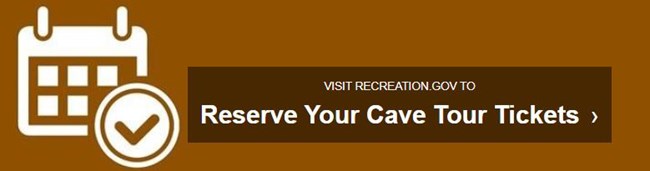 Brown rectangle with white calendar and check mark symbol with the words Visit Recreation.gov to Reserve Your Cave Tour Tickets