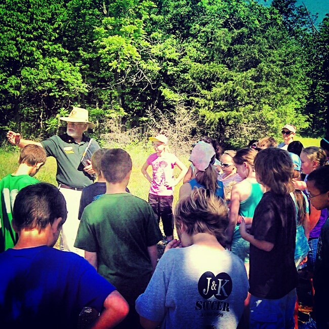 Volunteer giving tour of Bloody Hill