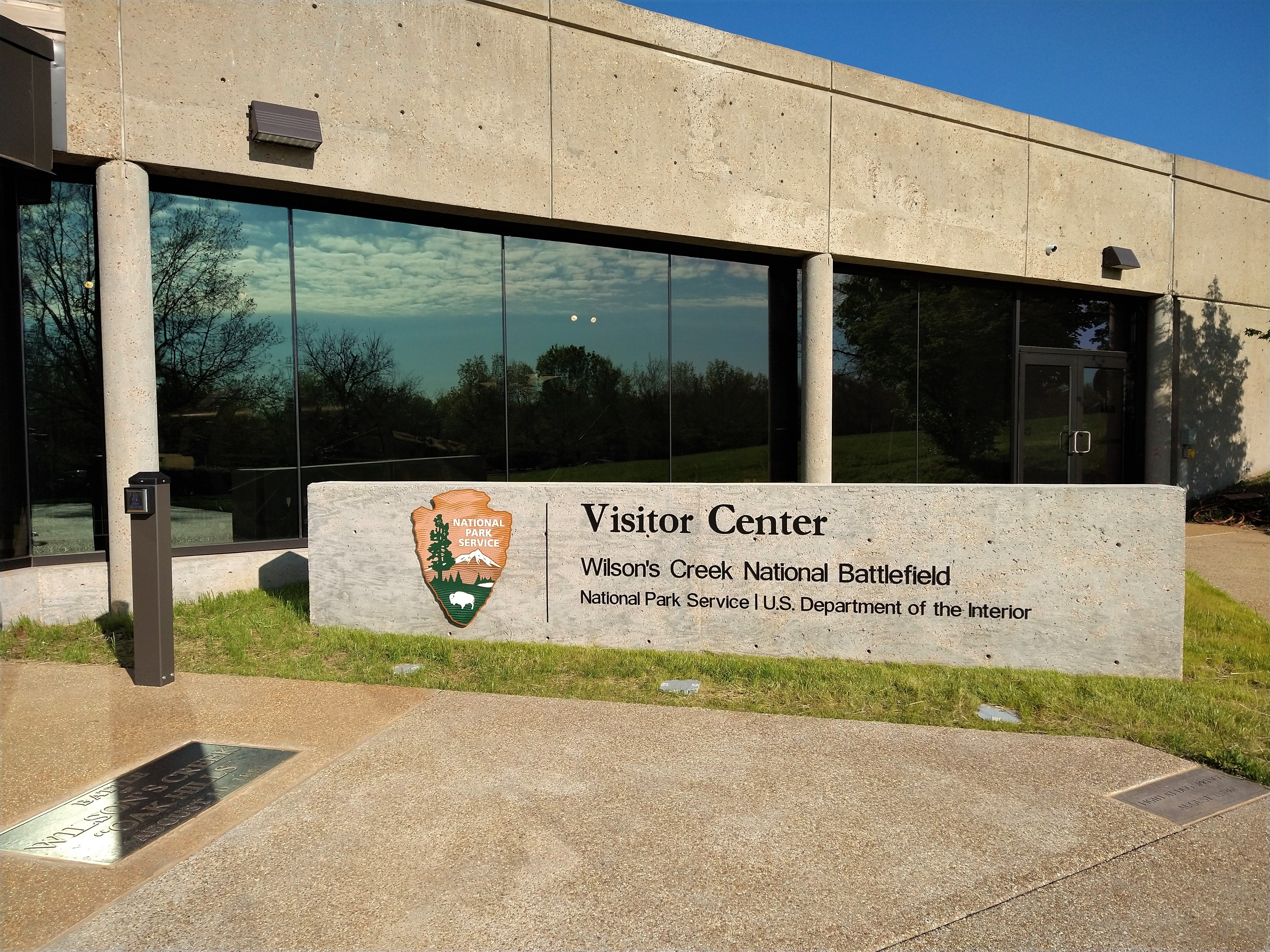 WICR VC Exterior sign - 5-13-2021 Wilson's Creek National Battlefield Exterior of Visitor Center with sign and view of front lawn