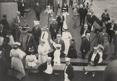 Passengers aboard the SS Manchuria Several people loitering on the deck of a ship with ocean in right background
