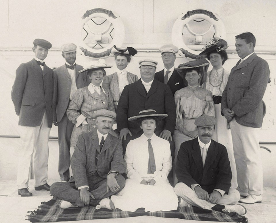 Taft and companions on ship Several members of the Taft delegation posing for a photo aboard a ship