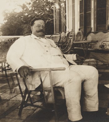 Taft as Gov Gen of Philippines William Taft sitting in a chair outside