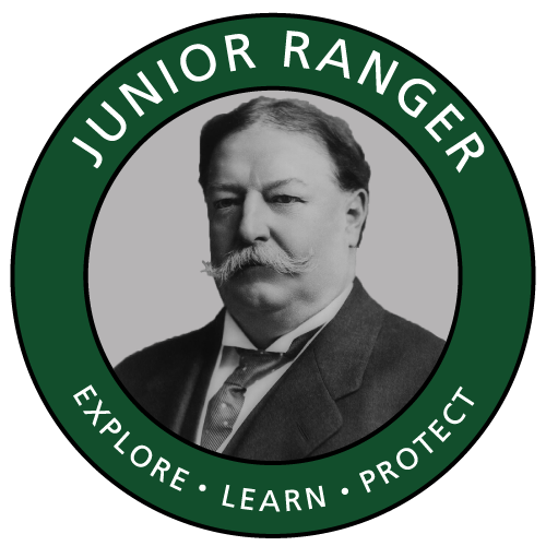 WIHO Jr. Ranger Logo Green circle logo with picture of Taft in middle