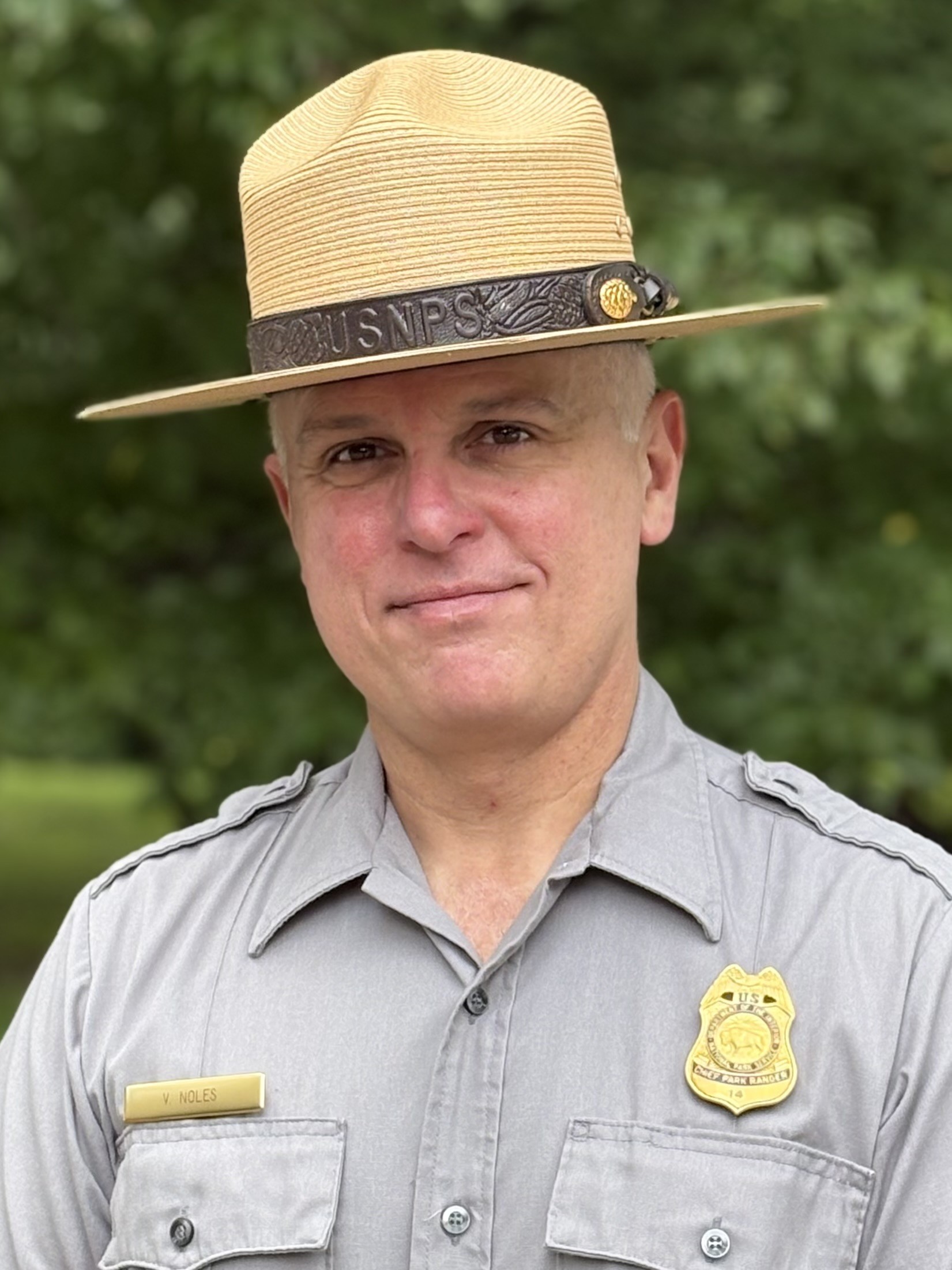 Portrait of a man in uniform from the chest up