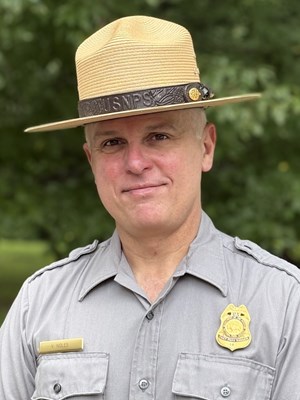 Portrait of a man in uniform from the chest up