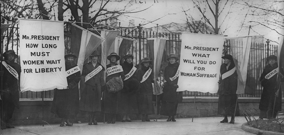 Women picketing in front of the White House for the right to vote.