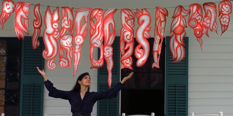 Photo of Andrea displaying some of her art. “Center of the Rebellion”* An exhibition of site-specific works by artist Andrea Arroyo, at the historic Elizabeth Cady Stanton House in Seneca Falls, NY. Photo of Andrea displaying some of her art. “Center of the Rebellion”* An exhibition of site-specific works by artist Andrea Arroyo, at the historic Elizabeth Cady Stanton House in Seneca Falls, NY.