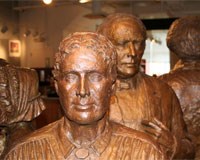 bronze statue of Jane Hunt with her husband Richard Hunt in back