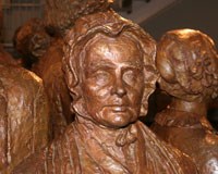 bronze statue of Lucretia Mott in the lobby of the park visitor center