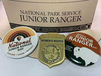 Junior Ranger paper hat, two buttons, and badge