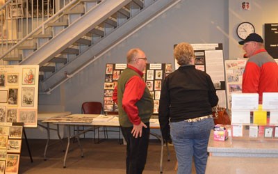 Seneca County Historian Walter Gable (left) shares his exhibit.