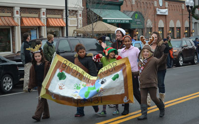 Local scouts join in the parade.
