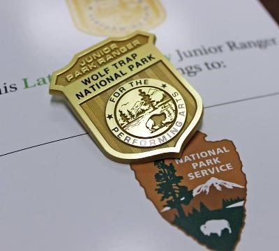 Wolf Trap Junior Ranger book and badge