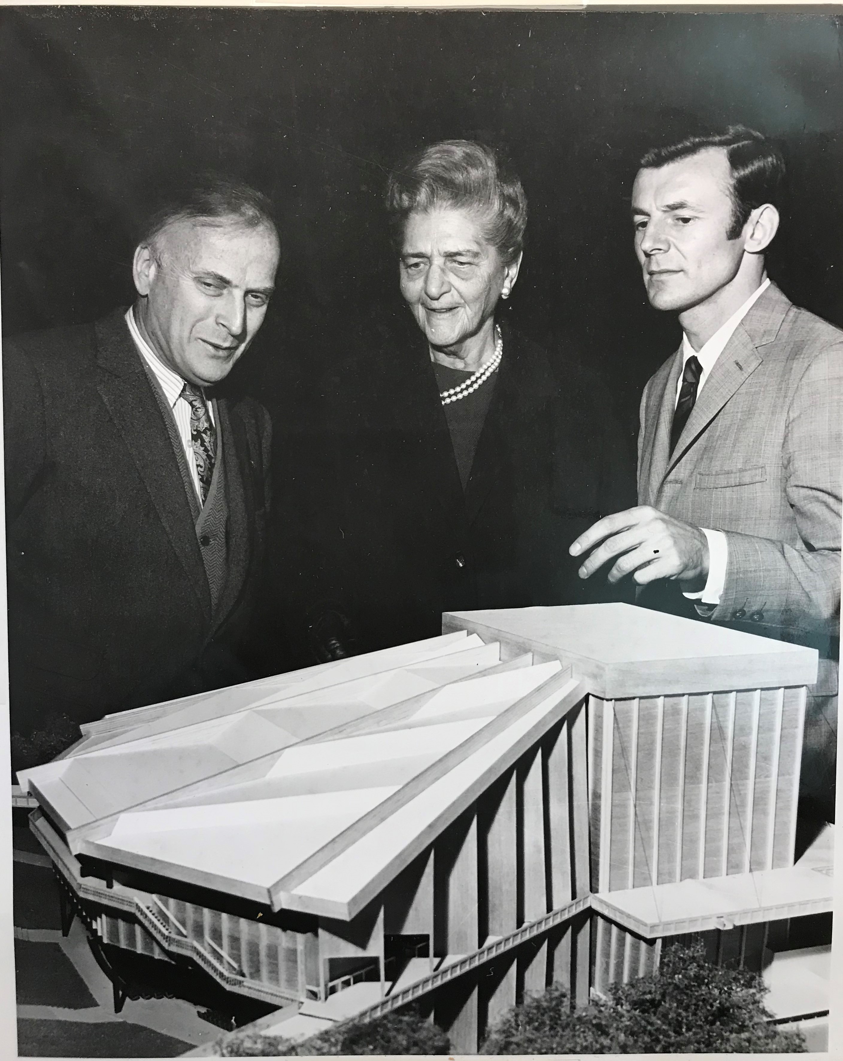 Catherine Filene Shouse (center) looks over a model of the original Filene Center in 1968. Catherine Filene Shouse (center) looks over a model of the original Filene Center in 1968.