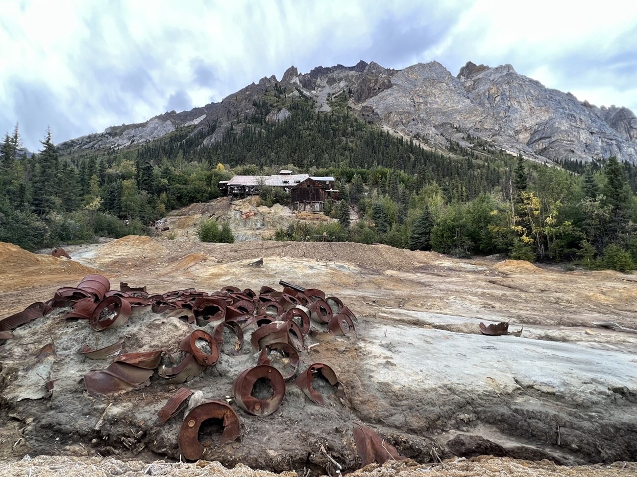 Nabesna Mine with old debris in the foreground and White Mountain in the background.