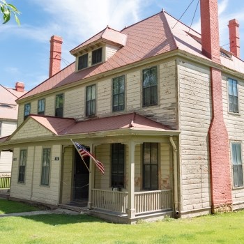 a large historical building with peeling paint