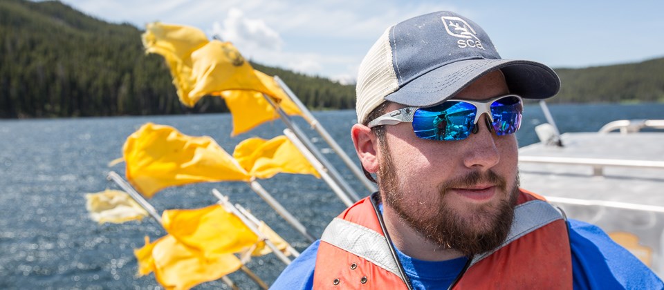 An SCA working with fisheries crews on Yellowstone Lake An SCA working with fisheries crews on Yellowstone Lake