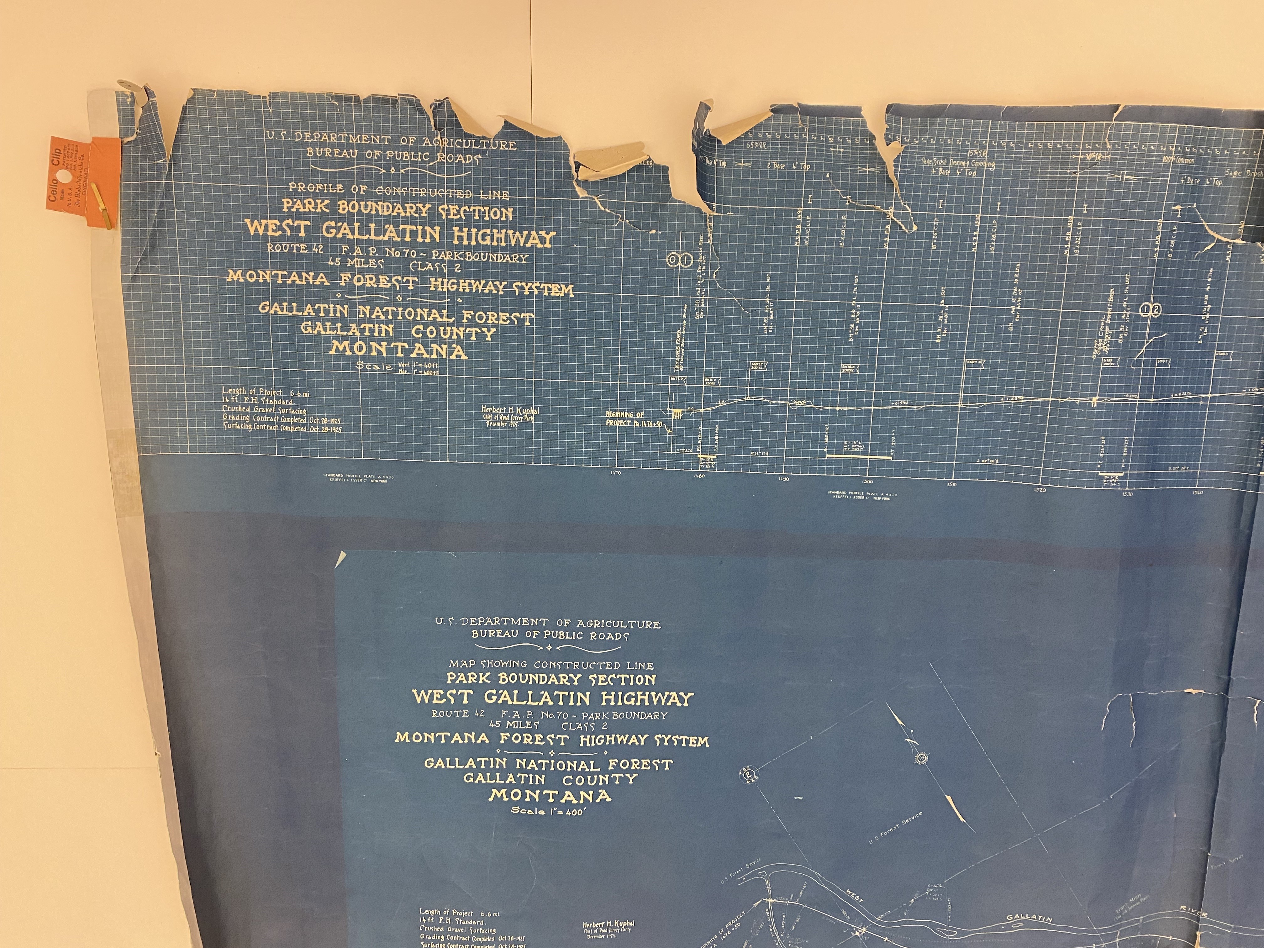 A blueprint with a lot of rips and torn edges