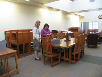 Reviewing a rare book in the HRC's research room.