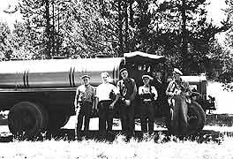 (YELL 2012-5) A recently acquired photograph depicts five men, probably drivers, posed with a tanker truck similar to the vehicle currently in the park's museum collection.