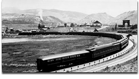 Historical photo with train pulling into Gardiner depot and Roosevelt Arch in the background. Historical photo with train pulling into Gardiner depot and Roosevelt Arch in the background.