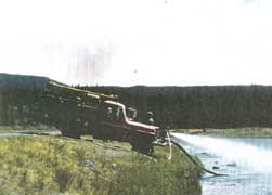 YELL 131735-3 Another view of a Willys/Howe "Pumper" taken during the 1988 fires in Yellowstone. Location is the Madison River Canyon where the vehicle and crew were involved in suppressing the North Fork Fire.