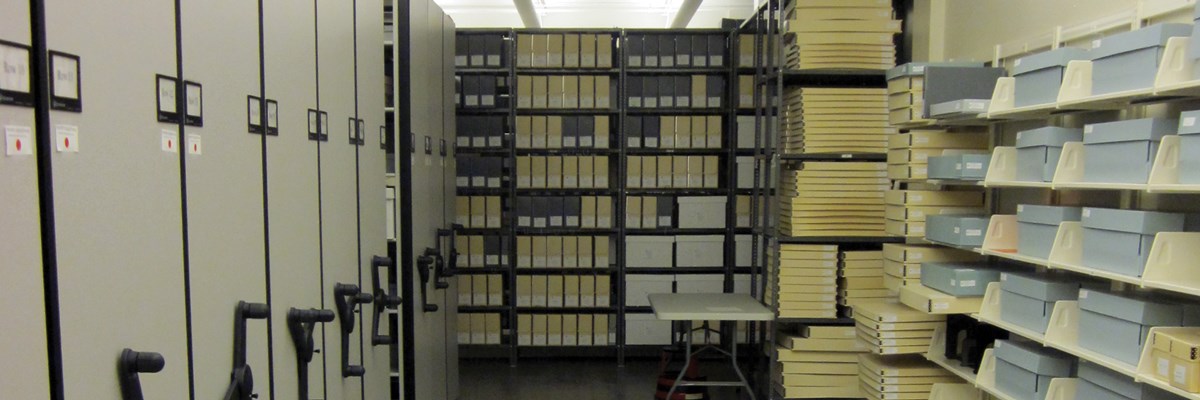 Tall cabinets filled with neat rows of yellow and gray boxes
