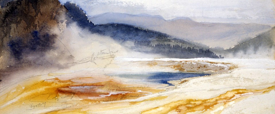Steam rises from a colorful hot spring overlooking mountains Steam rises from a colorful hot spring overlooking mountains