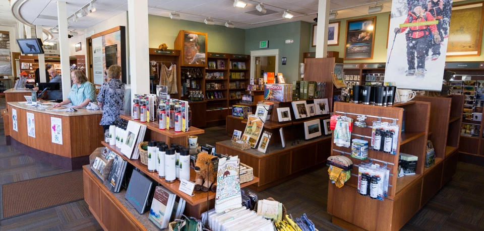 Yellowstone Forever Bookstore A indoor retail shop with staff and inventory