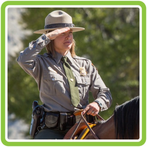 Ranger sitting on a horse and saluting