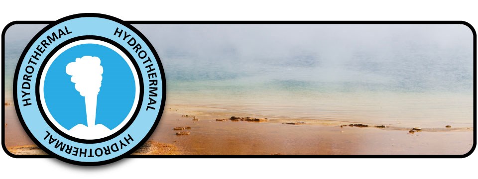 Blue badge with white silhouette of an eruption geyser over an image of a steaming pool of water.