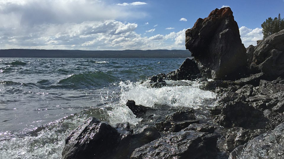 Shore of Yellowstone Lake with volcanic rocks Shore of Yellowstone Lake with volcanic rocks