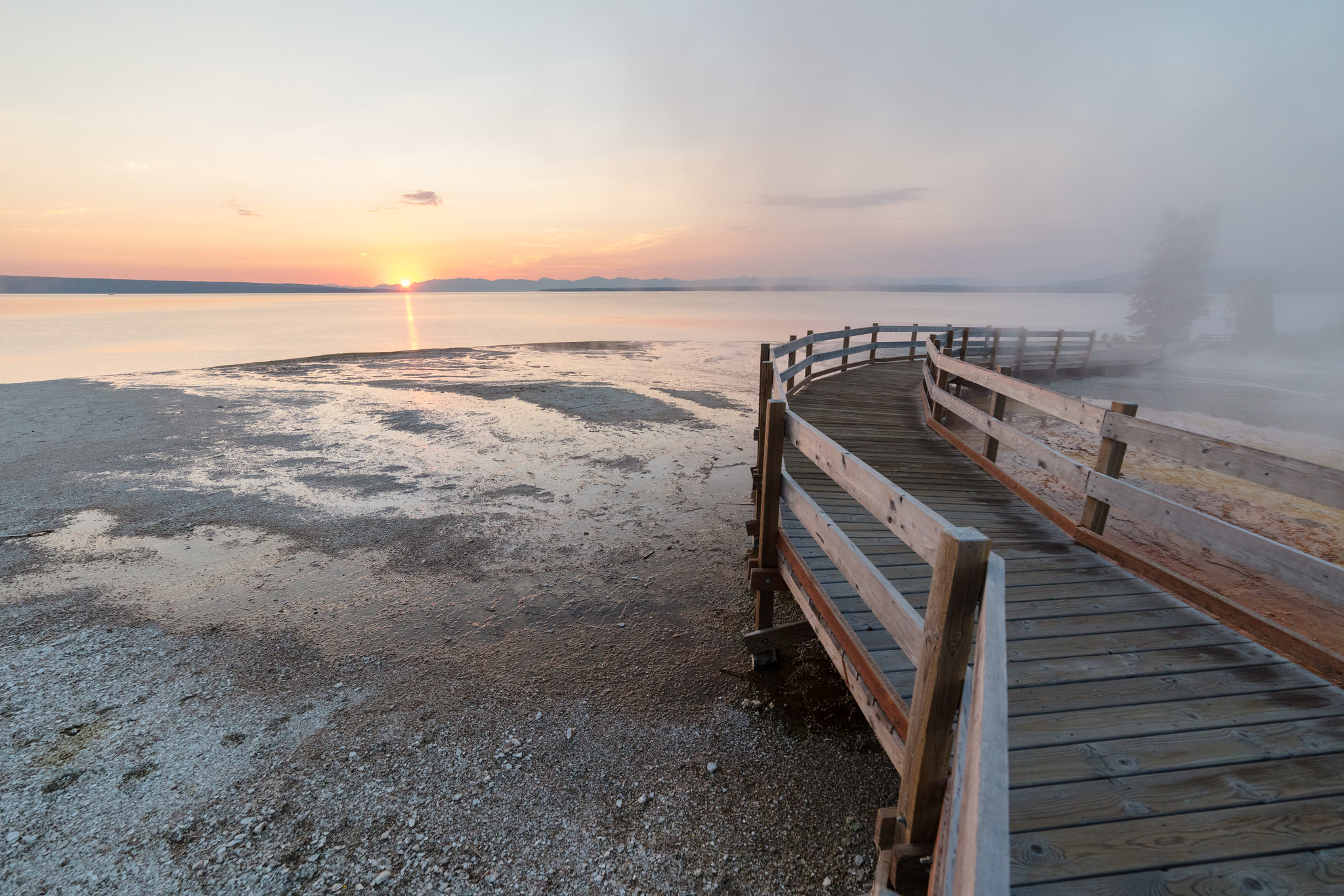 Steamy boardwalk at West Thumb Geyser Basin