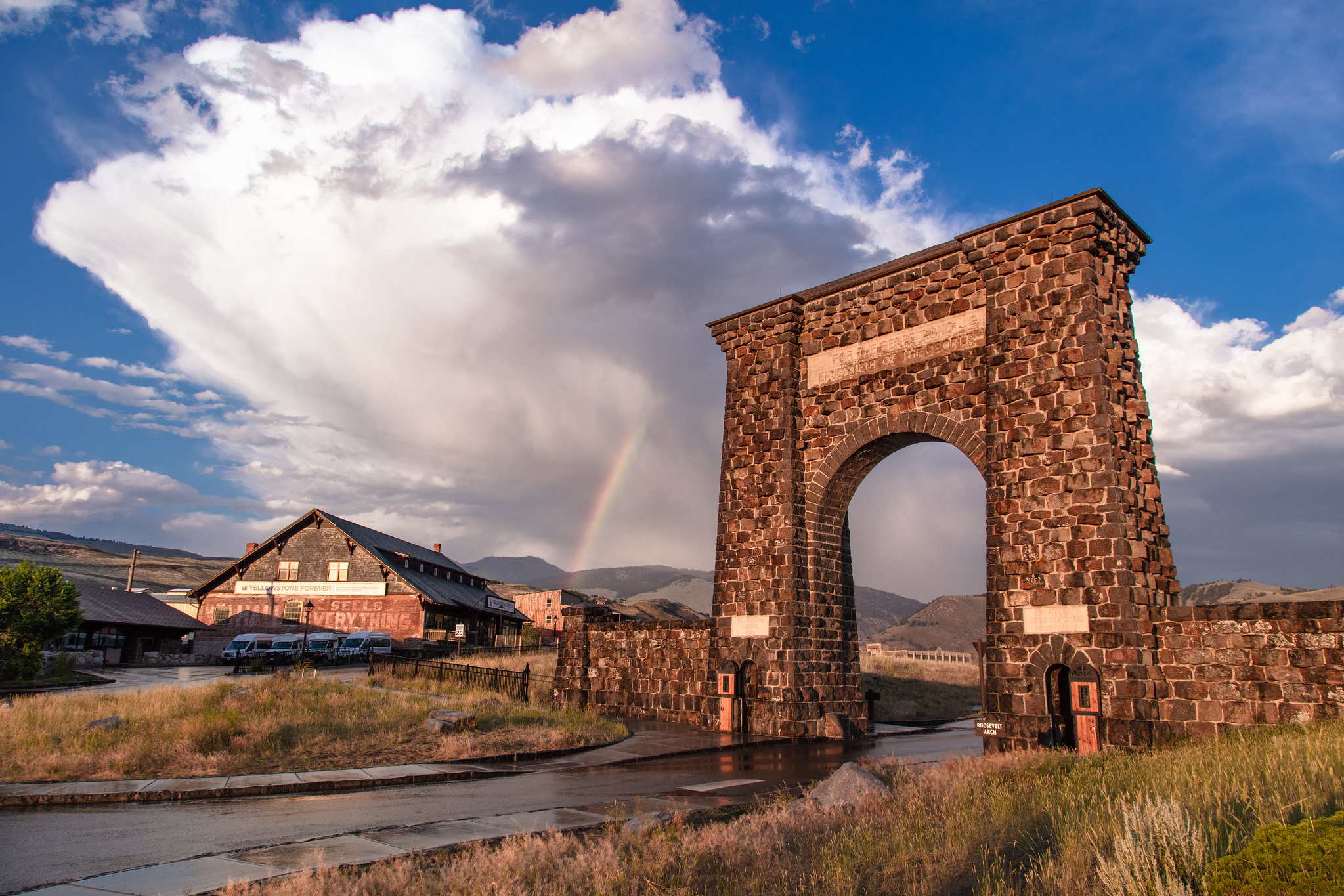 rainbow over Roosevelt Arch and Gardiner, MT