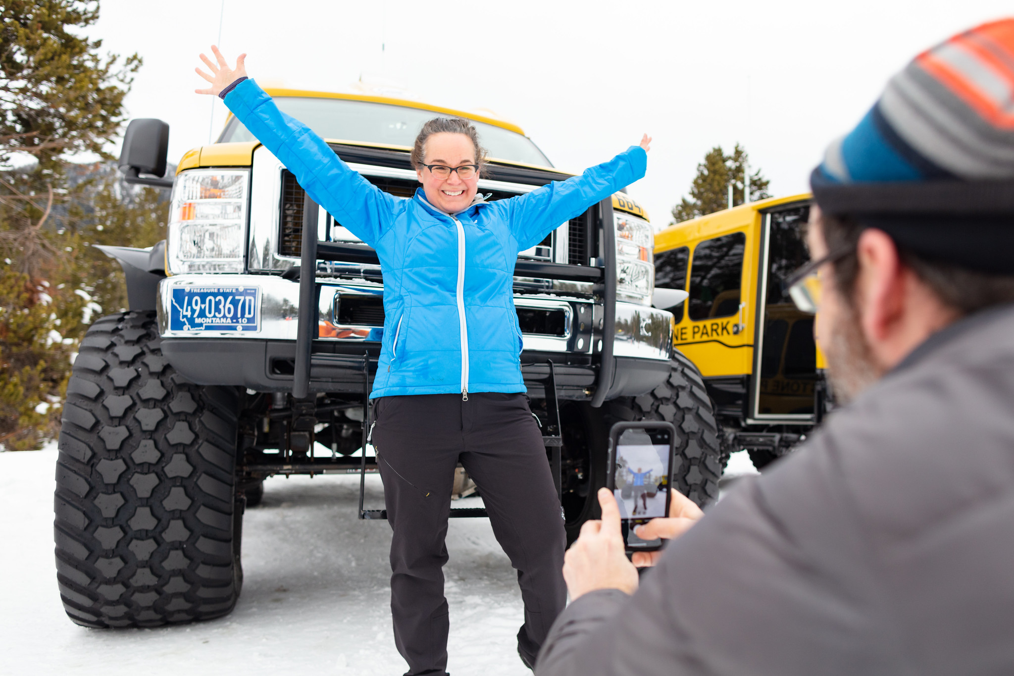 Posing with a snowcoach