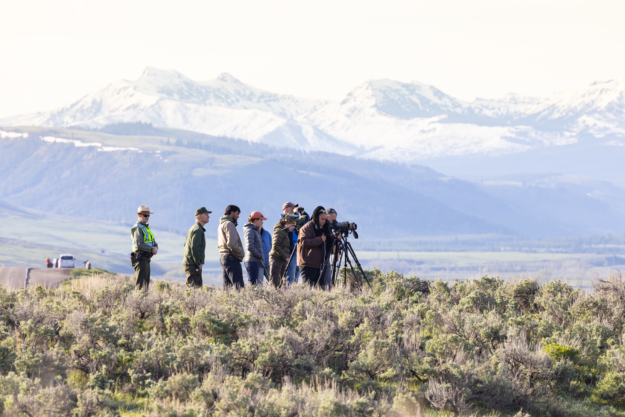 Visitors looking through spotting scope