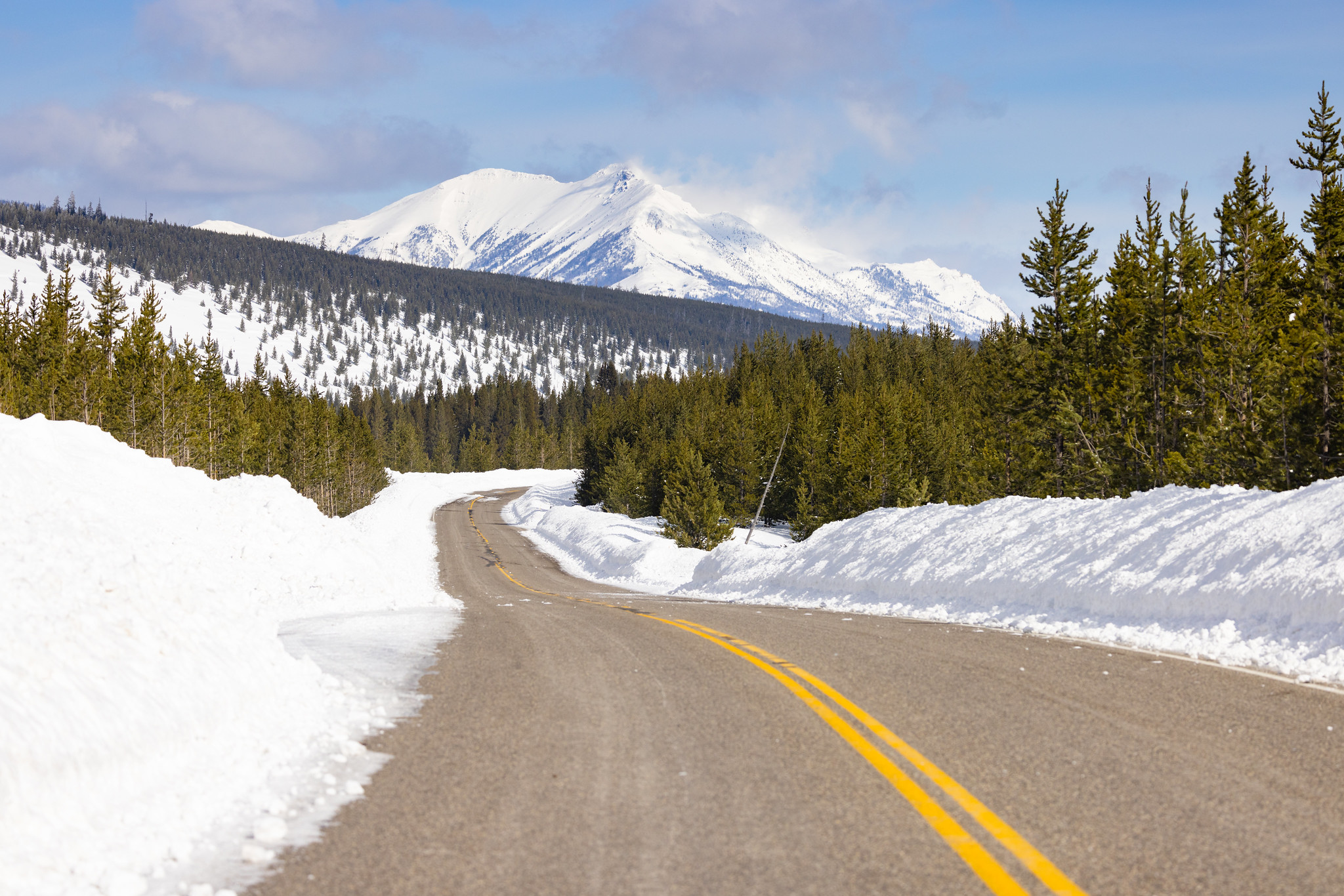 Spring biking road conditions 2023: tall snow banks
