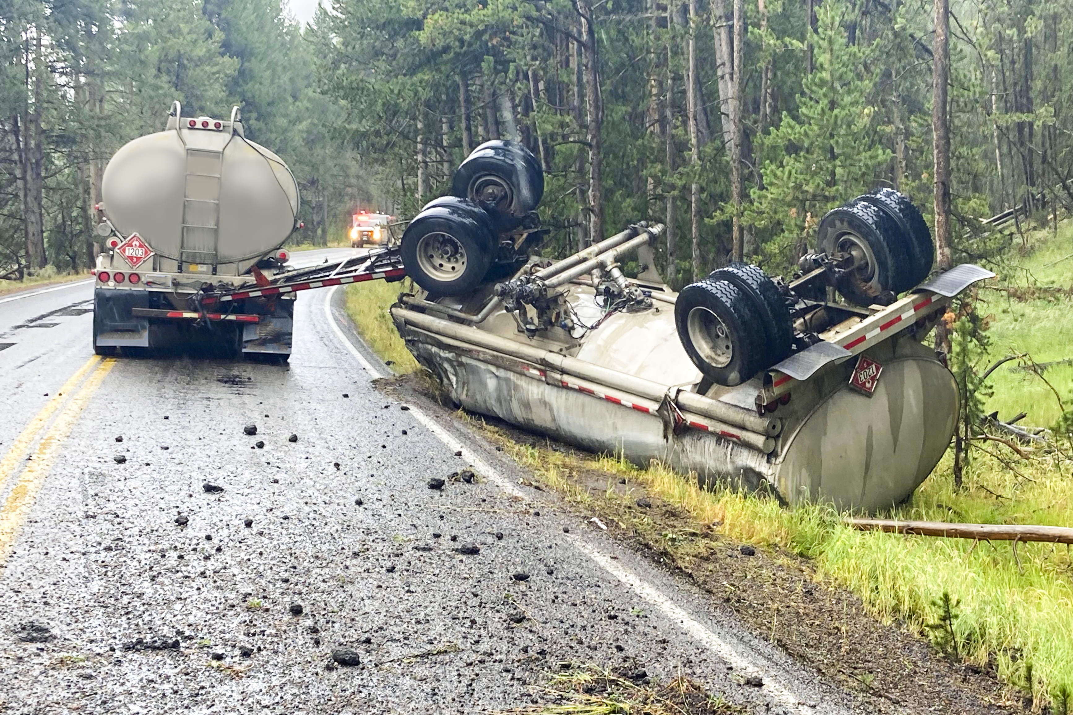 Overturned commercial motor vehicle tandem trailer