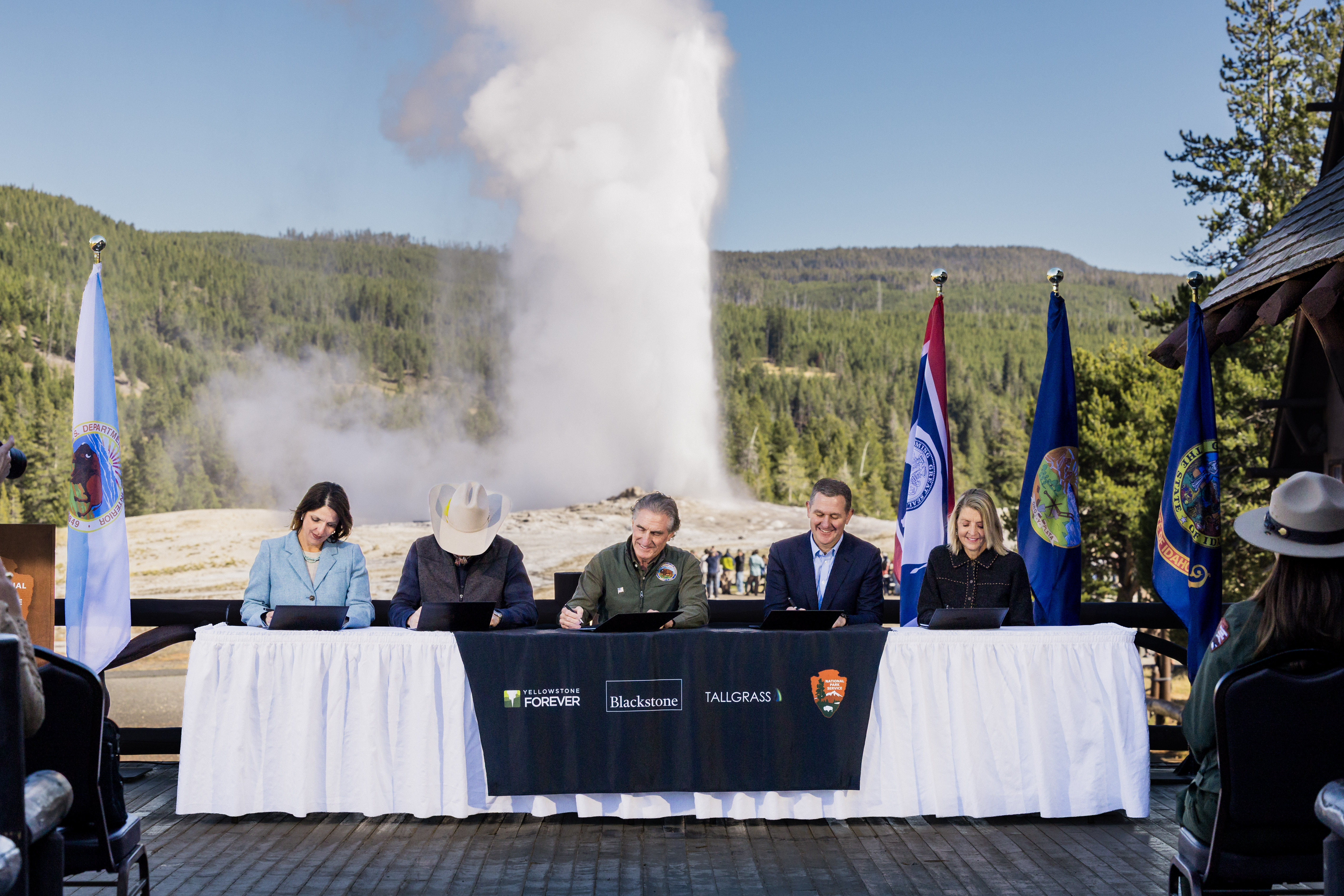 Photo of ceremonial signing of donation certificate