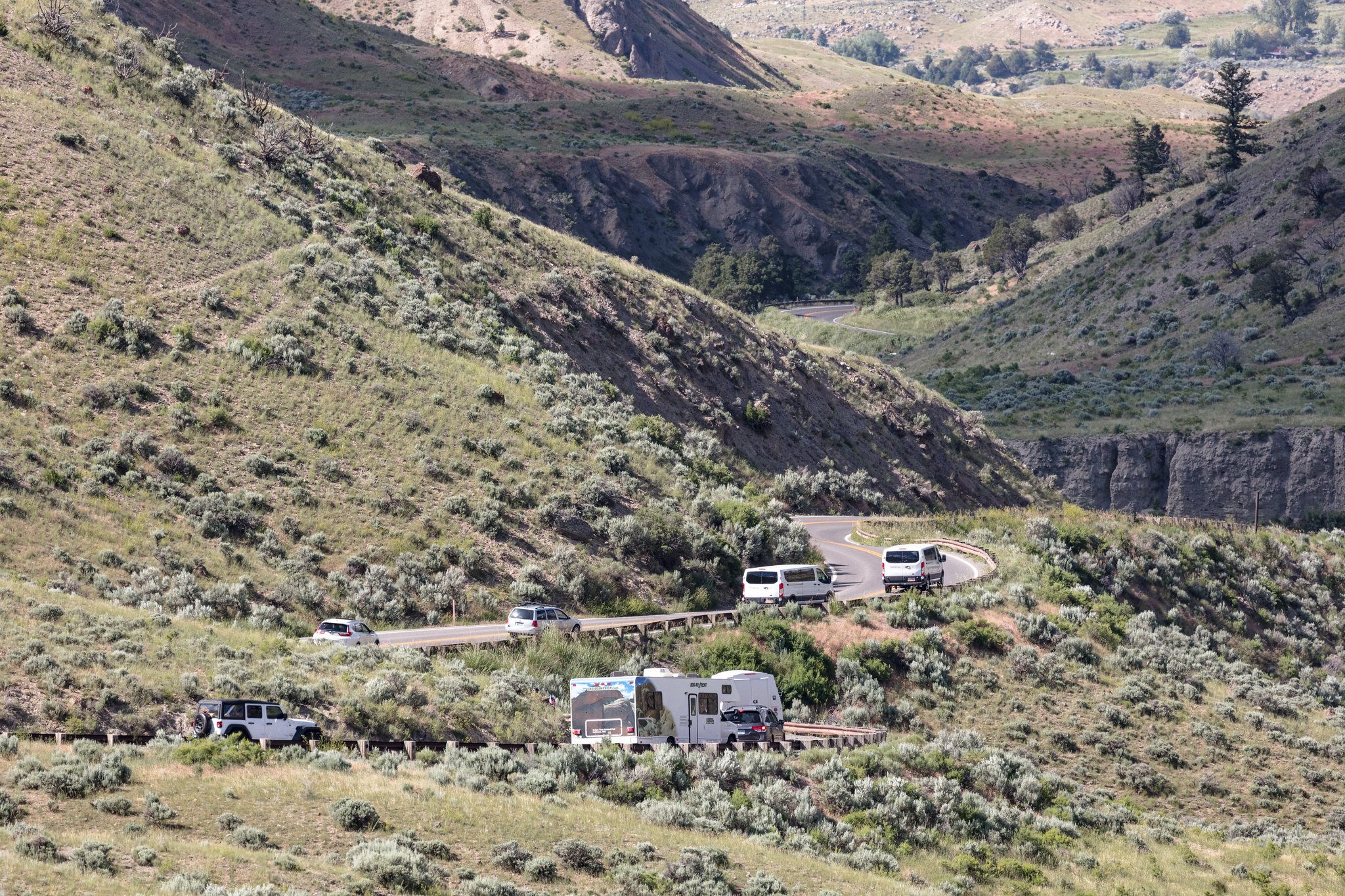 Cars and motorhomes traveling on the roadway