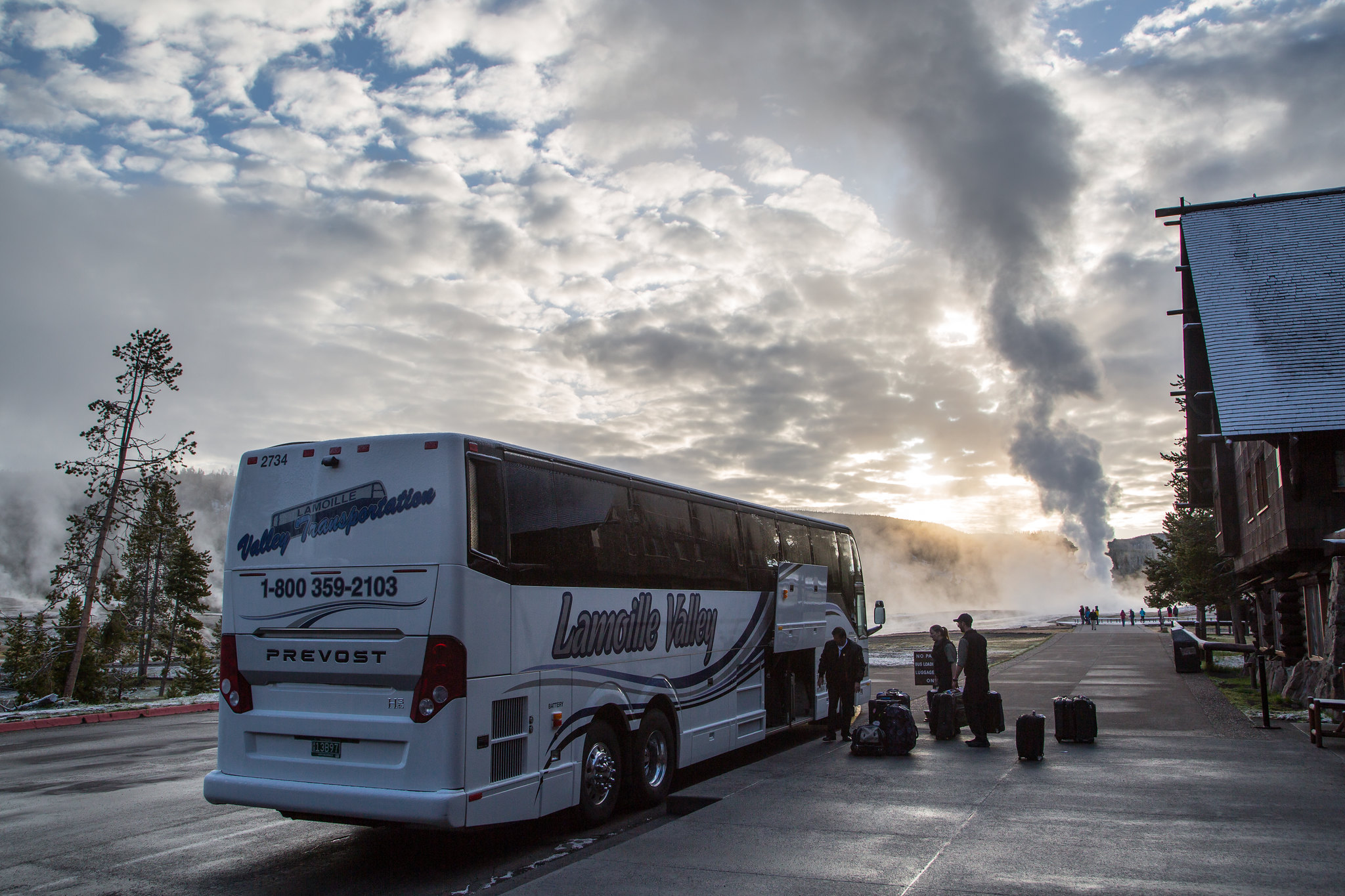 Loading a bus at the Old Faithful Inn