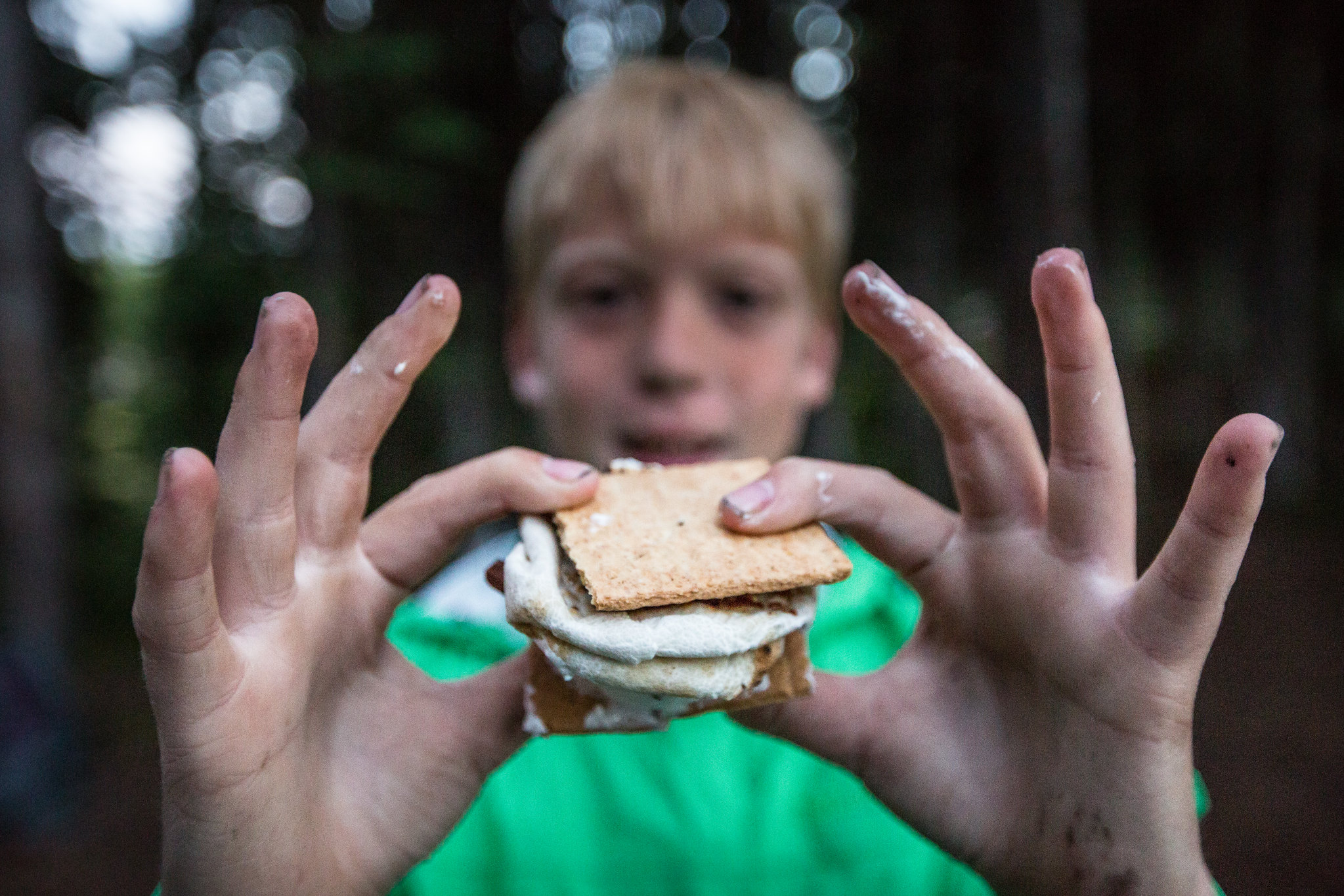 Boy holding up smores