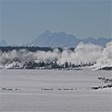 Frozen, snow-covered lake