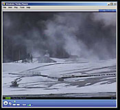 Snow-covered view of the Upper Geyser Basin.
